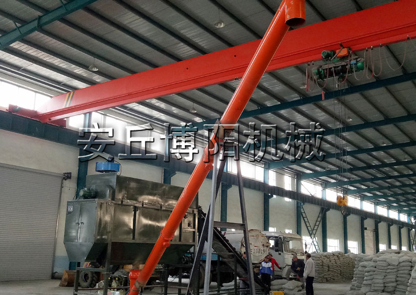 50kg水泥自動破袋機的工業(yè)原理是什么？